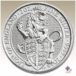 lion with a shield on a silver coin