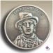 Billy the Kid face on a coin