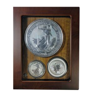 a group of silver coins in a wooden case