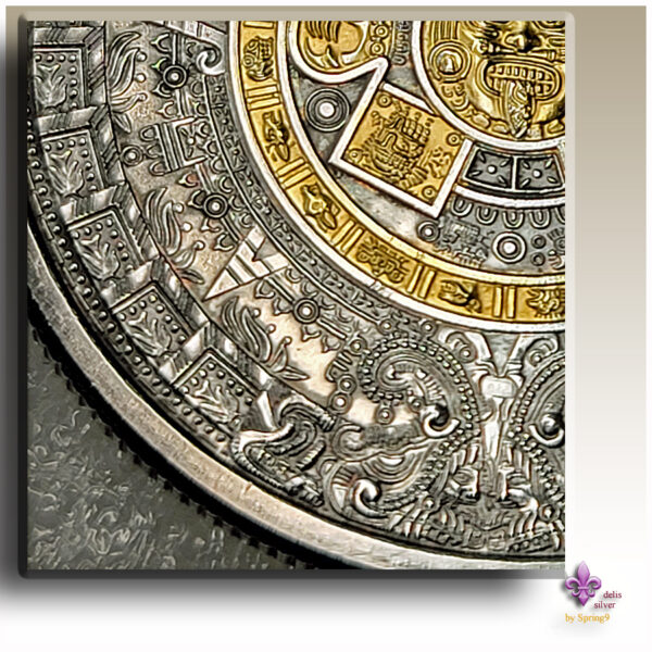 gilded Aztec Callendar coin in a capsule