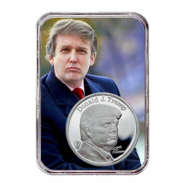 a silver coin with a man in a suit