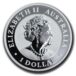 a silver coin with a woman in a crown