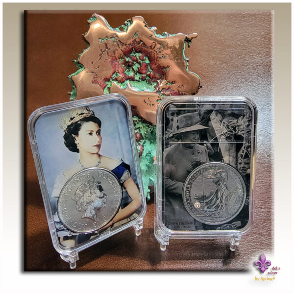 two slabs with queen and silver coins