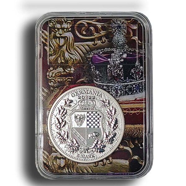 slab with a Germania silver coin