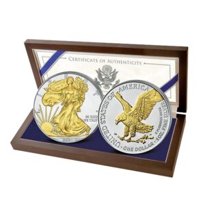 two silver coins in a presentation case