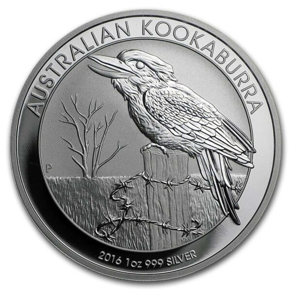 a silver coin with a bird on it