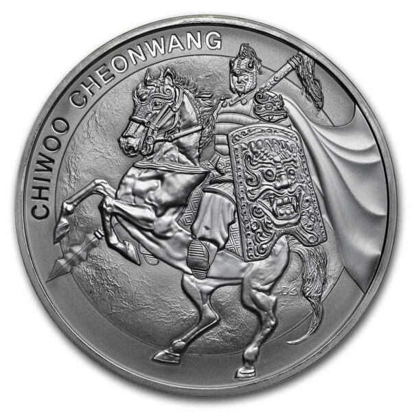 a silver coin with a man on a horse