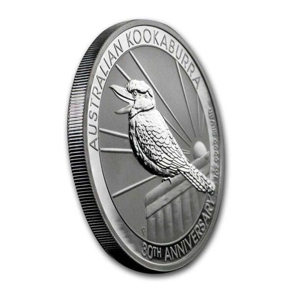 a silver coin with a bird on it