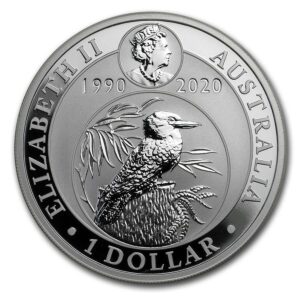 a silver coin with a bird and text