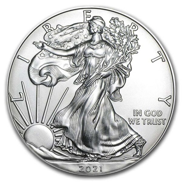 a silver coin with a woman holding a tree