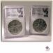a pair of silver coins in plastic cases