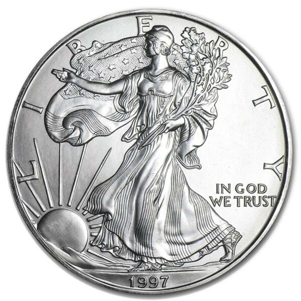 a silver coin with a woman holding a plant