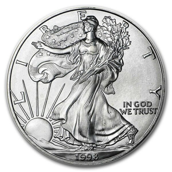 a silver coin with a woman holding a plant