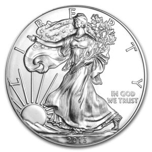2013 American Silver Eagle a silver coin with a woman holding a tree