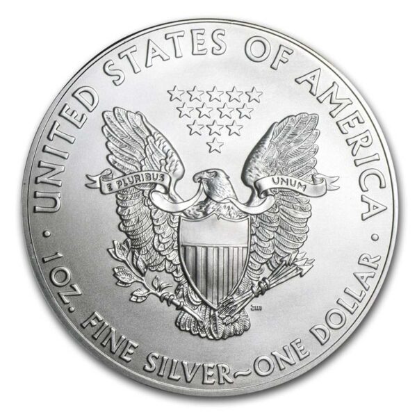 a silver coin with a eagle and shield