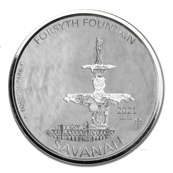 a coin with a fountain on it