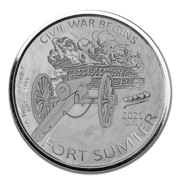 a silver coin with a picture of a cannon and text