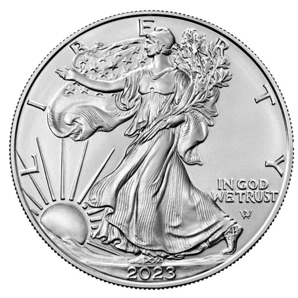 a silver coin with a woman in a dress