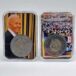 a silver coin in plastic cases