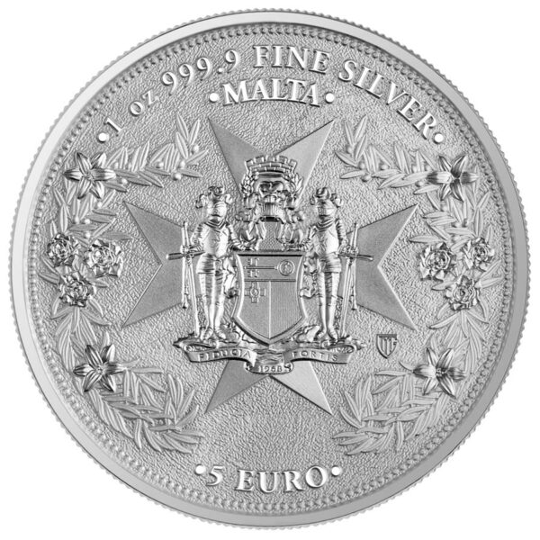 a silver coin with a design on it