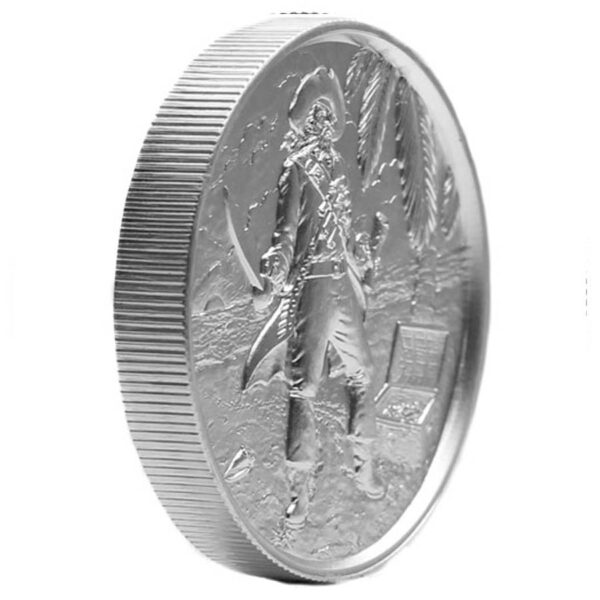 a silver coin with a pirate figure on it