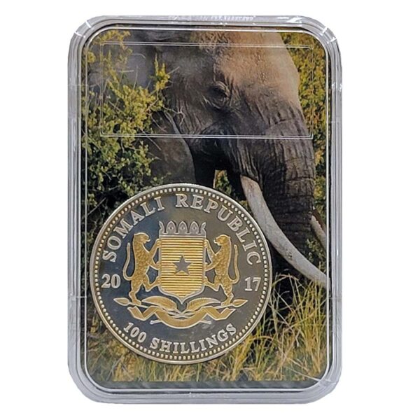 a silver coin with a picture of an elephant