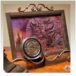 a coin in a frame