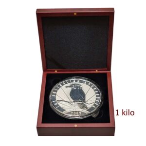 a silver coin in a box